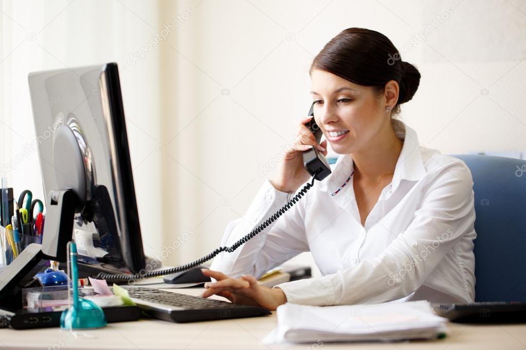 Businesswoman talking by phone