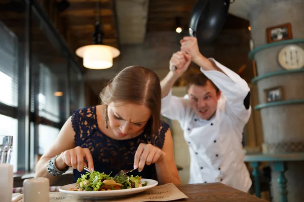 Annoying guest and chiefs pan — Stock Photo, Image