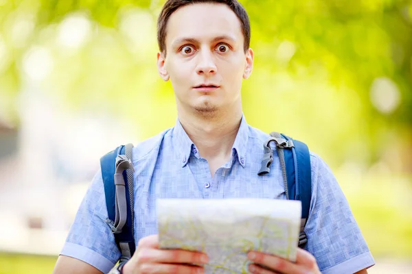 Tourist with map.
