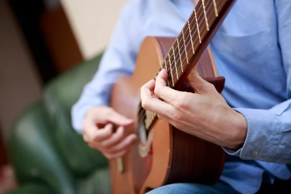 Man playing classic, acoustic guitar — Stock Photo, Image