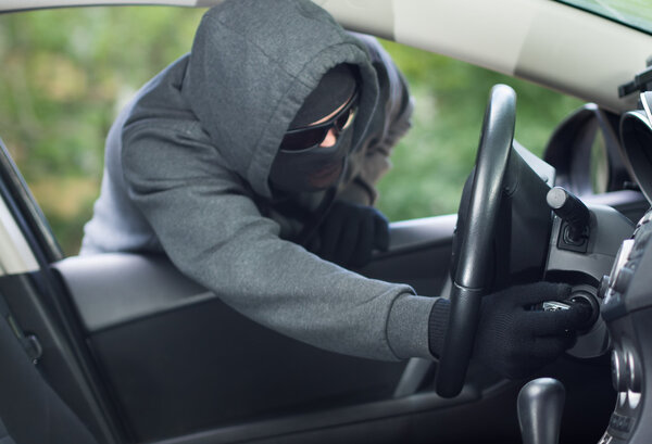 Burglar wearing mask balaclava, car burglary