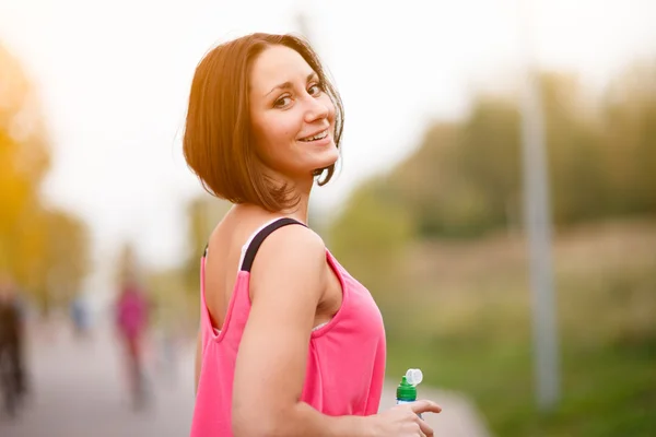 Woman standing and resting after run — Stock Photo, Image