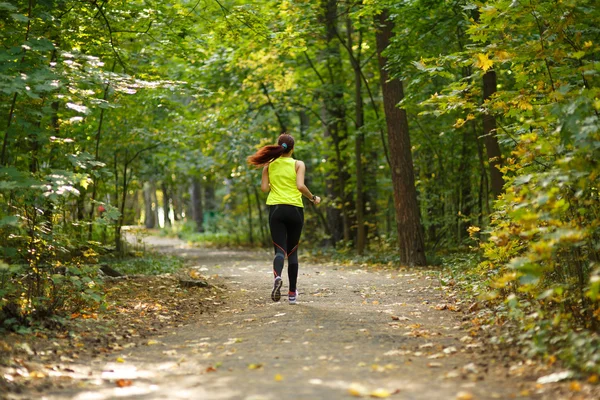 woman running at forest