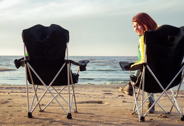 woman sitting on chair