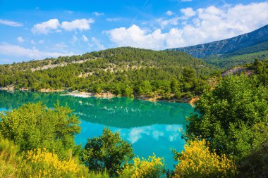 SprinAzure water reflecting clouds