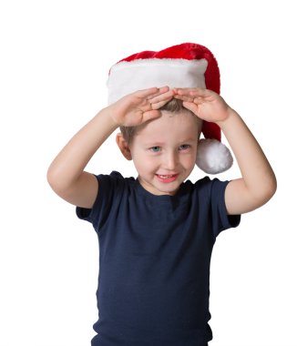 Noel Baba'nın kırmızı bere içindeki çocuk