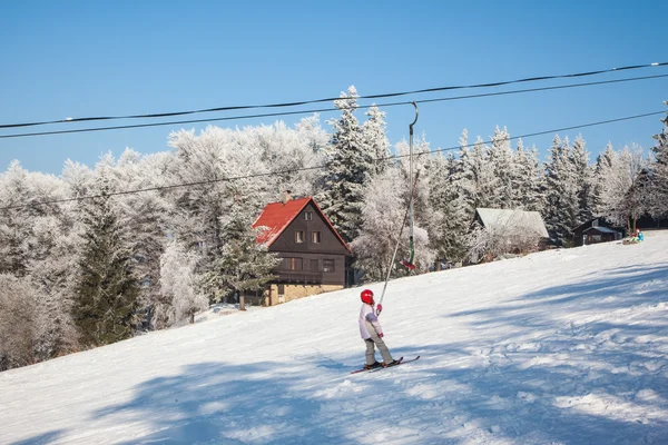 Rolled-country skiing and ski lift passes through  mountain — Stock Photo, Image