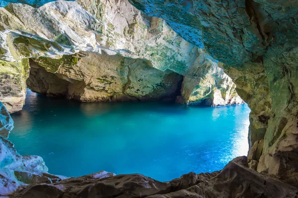 stock image  Karst cave Rosh-a-Nikra on the shores of the Mediterranean Sea. Israel. The color of sea water changes from azure to dark blue. The concept of active, environmental and photo tourism