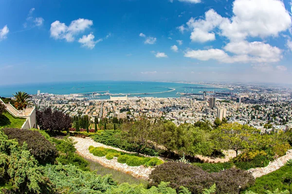 View from Mount Carmel to the international seaport of Haifa. Clear sunny day by the sea. Haifa, Israel. The descent to the Mediterranean Sea.