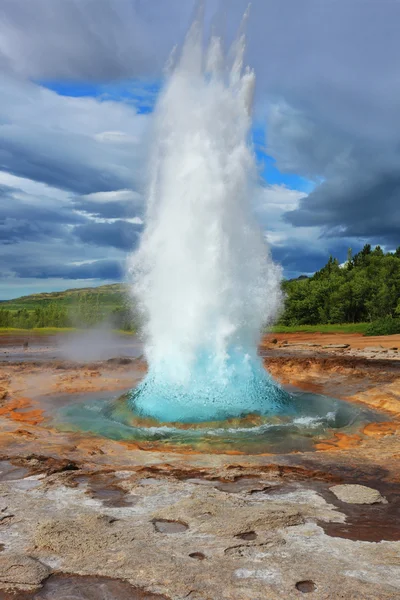 Fountain Geyser throws azure water Stock Image