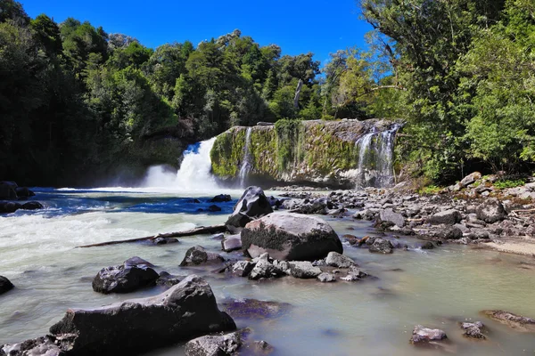 Cascading waterfall among rocks — Stock Photo, Image