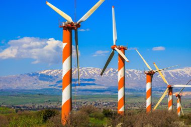 Several windmills in snow-covered Hermon