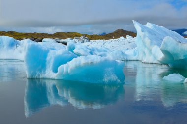 blue icebergs and ice floes