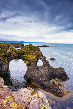 coastal cliffs near fishing village Arnastapi