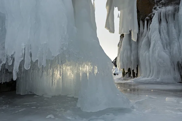 Huge icicles on rocks. — Stock Photo, Image