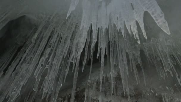 Huge icicles on rocks. — Stock Video