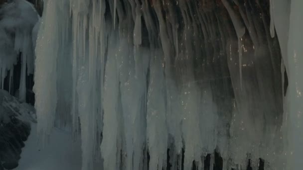 Huge icicles on rocks. — Stock Video