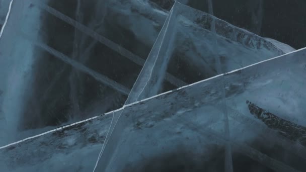 Cracks in transparent ice. — Stock Video