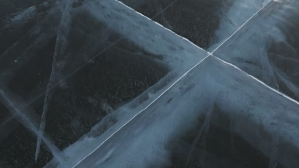 Cracks in transparent ice. — Stock Video