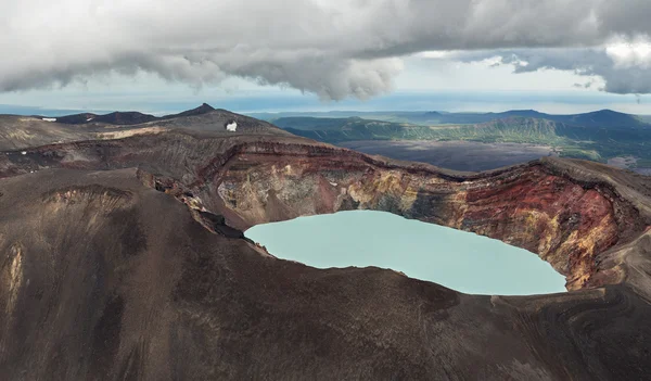 stock image Maly Semyachik is a stratovolcano with acidic crater lake. Kronotsky Nature Reserve on Kamchatka Peninsula.