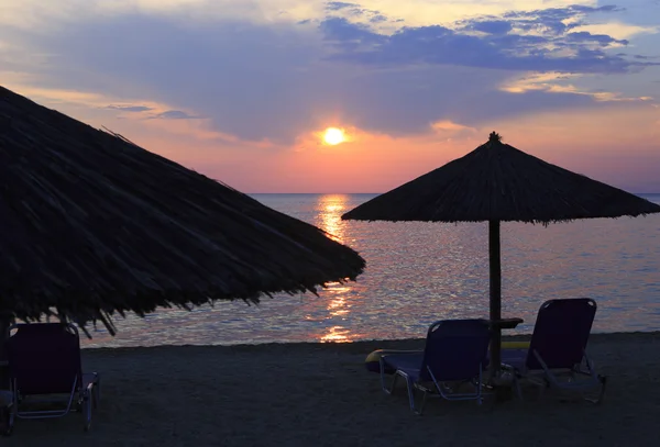 Puesta de sol en la playa Imagen de stock