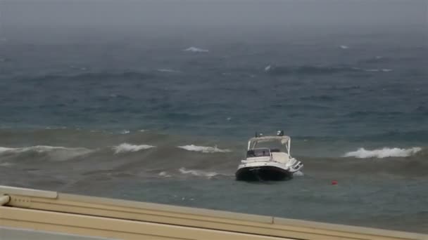 Boat on a leash in stormy Aegean Sea. Sithonia peninsula. Northern Greece. — Stock Video