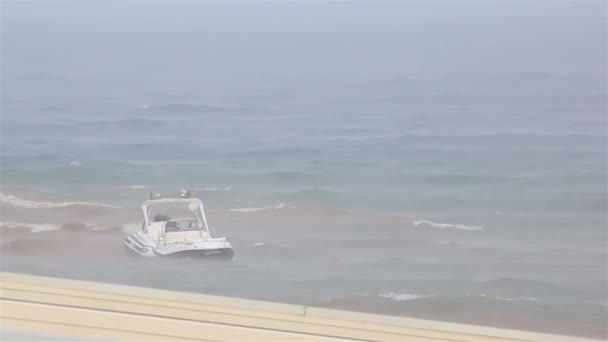 Boat on a leash in stormy Aegean Sea. Sithonia peninsula. Northern Greece. — Stock Video