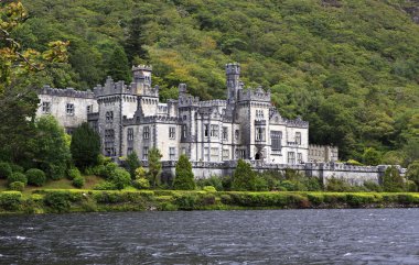 Kylemore Abbey on the lake. clipart