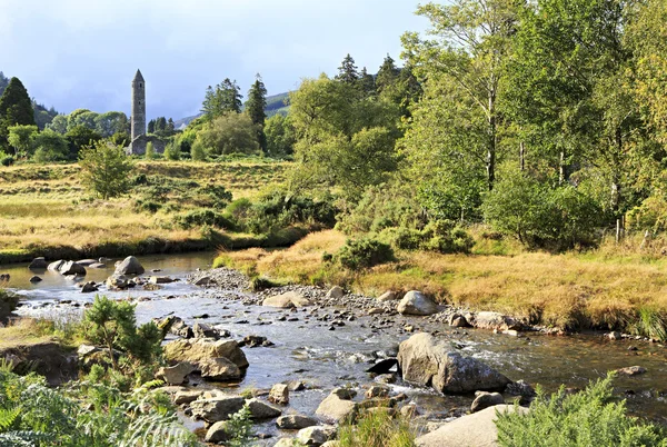 Summer landscape with medieval tower — Stock Photo, Image