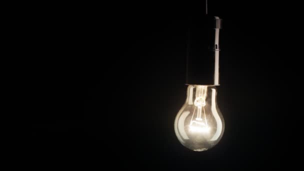 Real light bulb flickering. — Stock Video