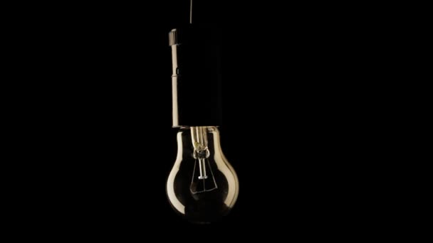 Real light bulb flickering. — Stock Video