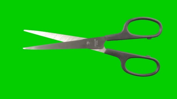 Scissors animated on a green screen background — Stock Video