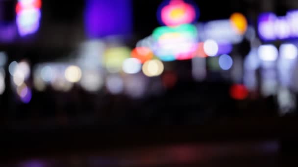 City Lights. Out of focus crowds of people and cars. — Stock Video