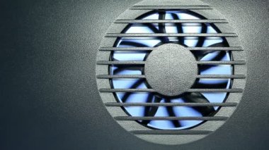 Endüstriyel fan türbin arkasında bir metal ızgara.