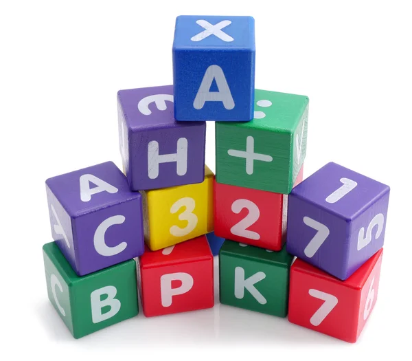 Wooden colored cubes tower toys. — Stock Photo, Image