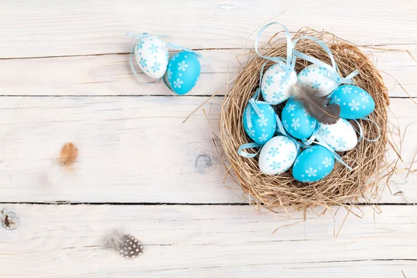 Easter background with eggs in nest — Stock Photo, Image