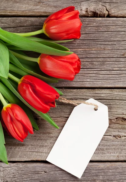 Valentine's day red tulips with tag — Stock Photo, Image