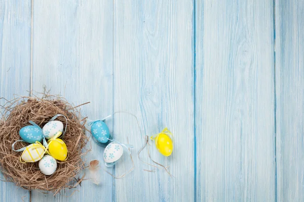 Easter background with eggs in nest — Stock Photo, Image