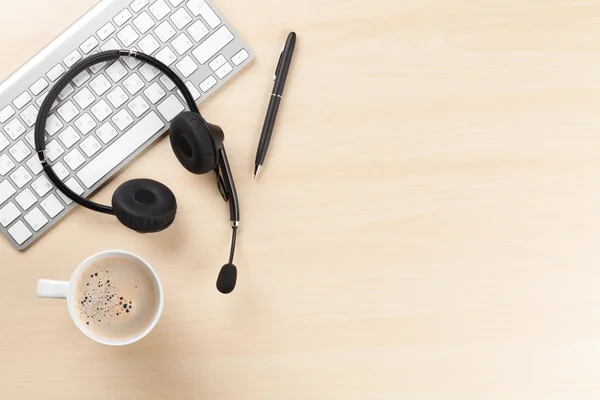 Office desk with headset — Stock Photo, Image