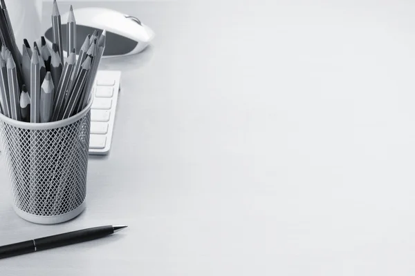 Office desk table with supplies — Stock Photo, Image