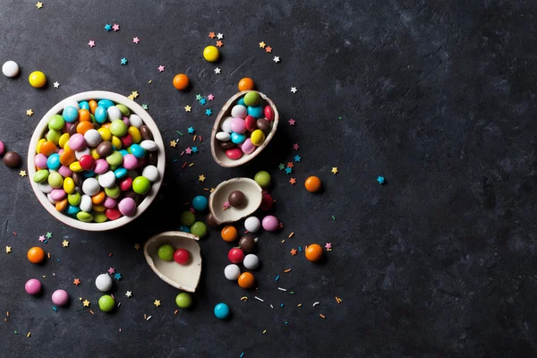 Doces coloridos no fundo de pedra — Fotografia de Stock