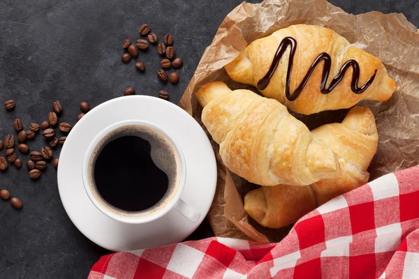 Fresh homemade croissants with chocolate and coffee — Stock Photo, Image