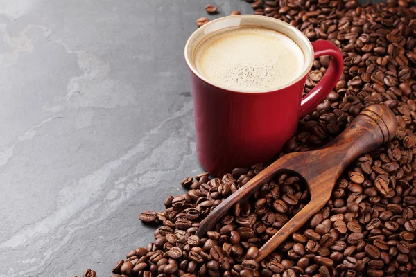 Šálek kávy a fazole — Stock fotografie