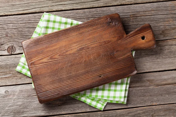 Cutting board over towel — Stock Photo, Image