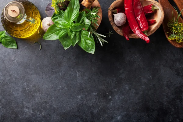 Fresh garden herbs in mortar — Stock Photo, Image