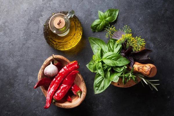 Fresh garden herbs in mortar — Stock Photo, Image