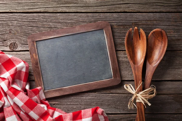 Blackboard and cooking utensils — Stock Photo, Image