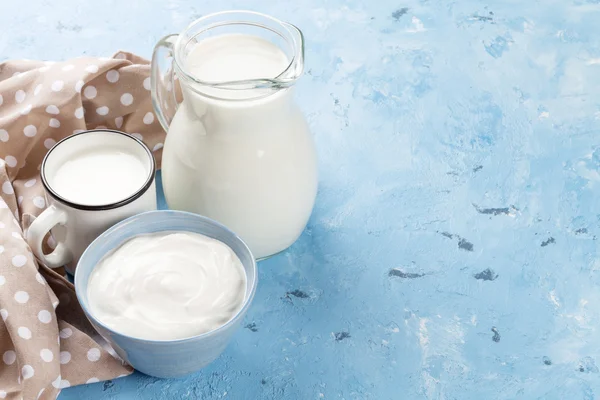 Dairy products on stone table — Stock Photo, Image