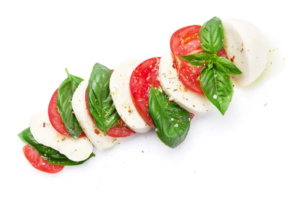 Caprese salade. Mozzarella, tomaten en basilicum — Stockfoto