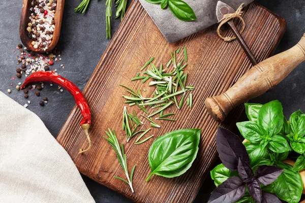 Herbs and spices on table — Stock Photo, Image